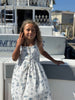 marina dress in navy beach scene