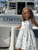 marina dress in navy beach scene