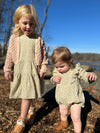 Baby and sister matching outfit tan bubble and tan dress in folklore  In 
