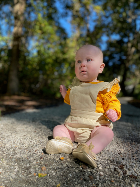 quinn onesie in mustard